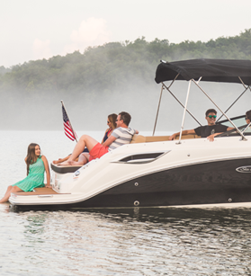 Group of people relaxing on a Sea Ray boat