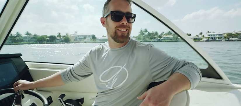Man driving a a Sailfish boat