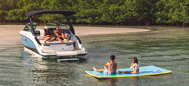 Family on a Sea Ray boat enjoying the water