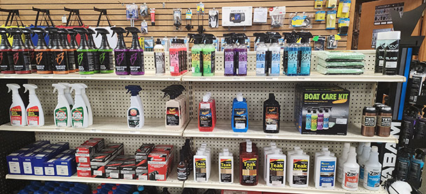 Boat maintenance products on the shelf of a ProShop store
