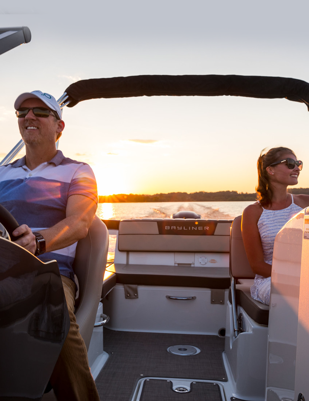 Couple on a boat at sunset