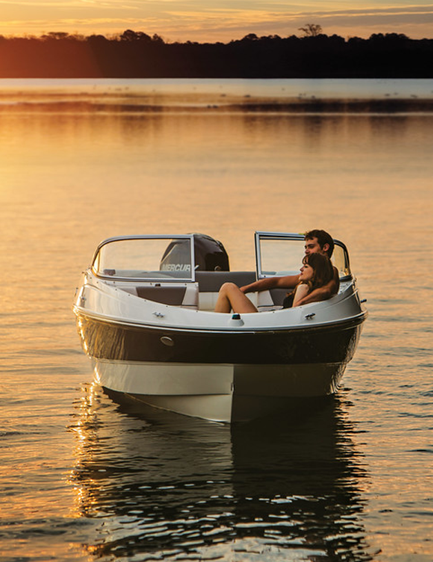 boat in the water at sunset