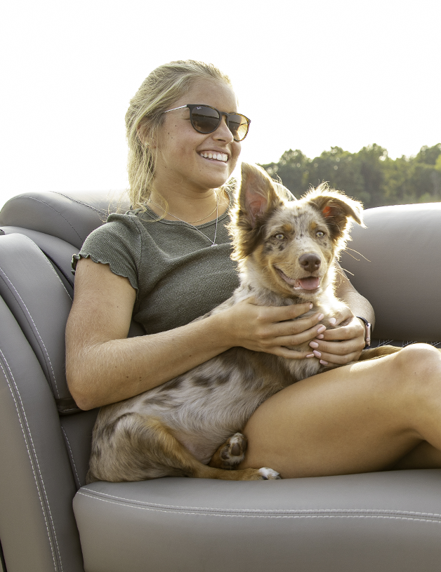 Woman sitting with a dog