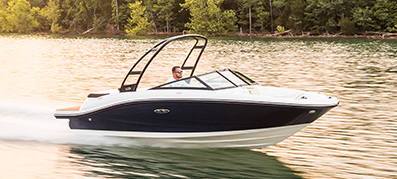 sea ray running on the water